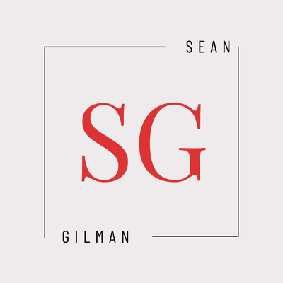 Sean Gilman logo. Red SG monogram with name in a square frame.