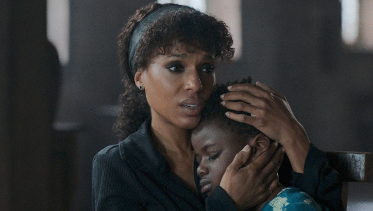 Shadow Force movie scene: Kerry Washington hugs a child. Mother and child embrace. Drama, emotion, film still.