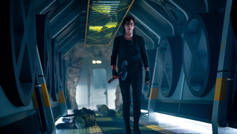 Charlize Theron as Andy in The Old Guard 2 on Netflix. Sci-fi action scene with axe.