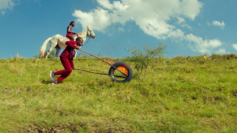 African youth pulling tire, rider on white horse. Visions of the Future, ancestral traditions, cultural identity.