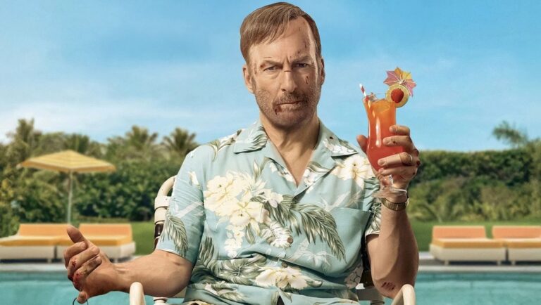 Bob Odenkirk as Hutch Mansell in Nobody. Bloody, holding cocktail.